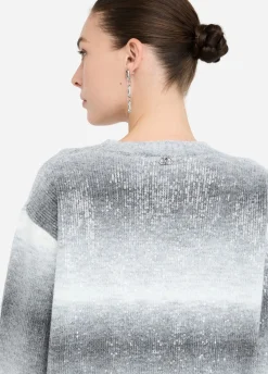 Abito in maglia con paillettes