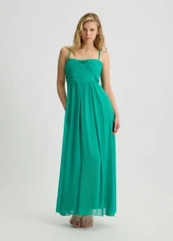 Abito lungo elegante con drappeggio
