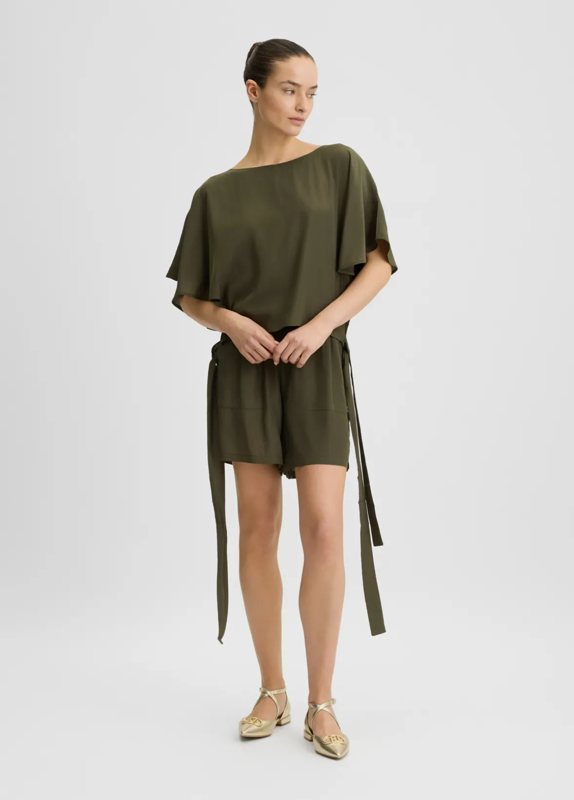 Blusa con fiocchi