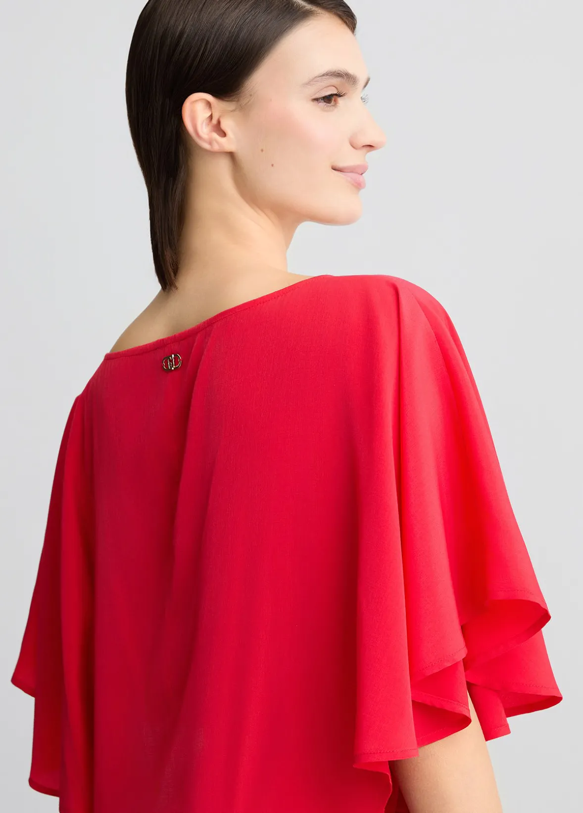Blusa con fiocchi