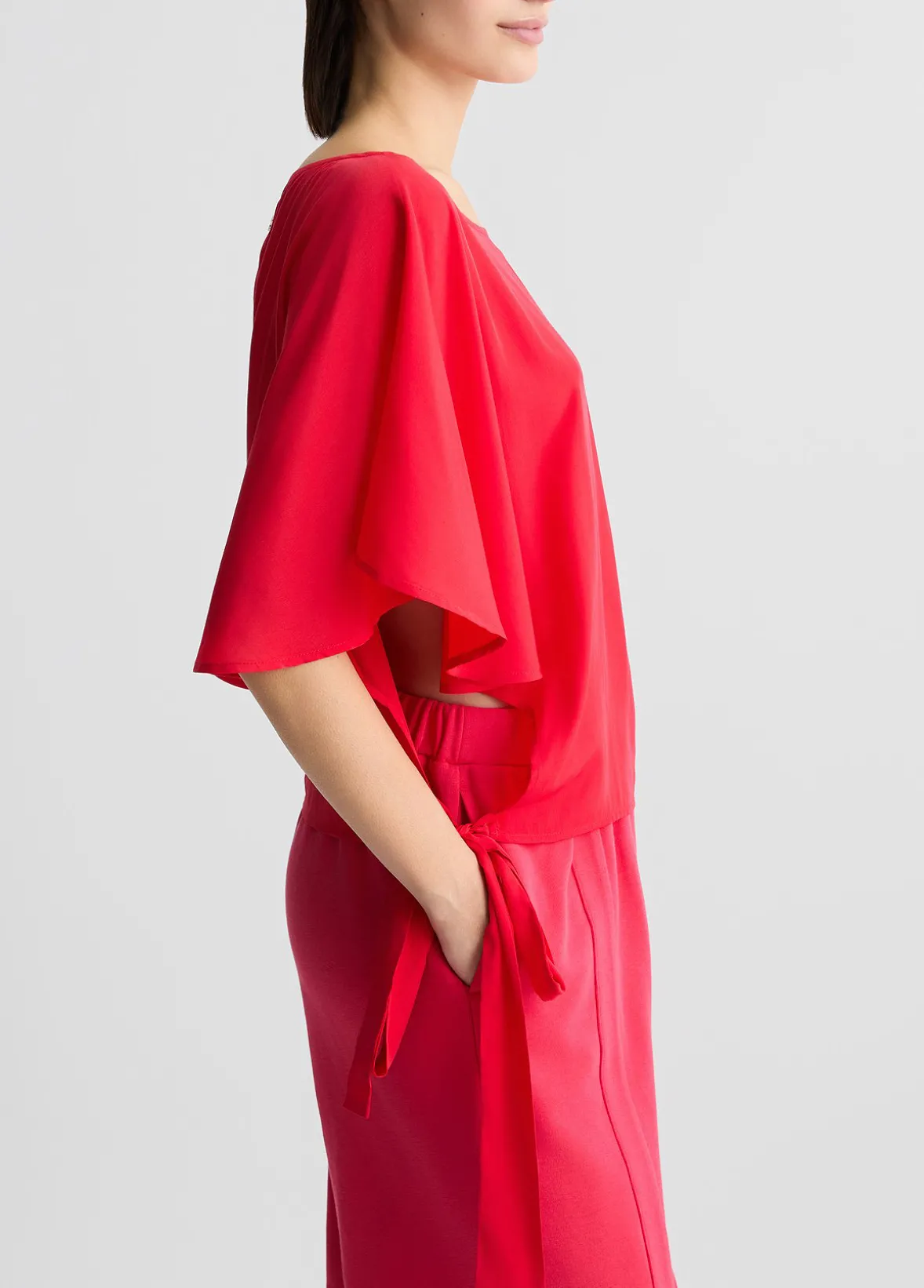 Blusa con fiocchi