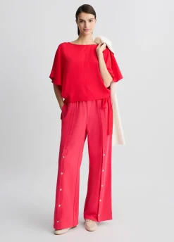 Blusa con fiocchi