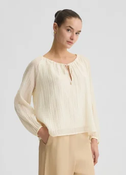 Blusa con laccetti
