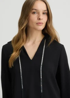 Blusa con strass