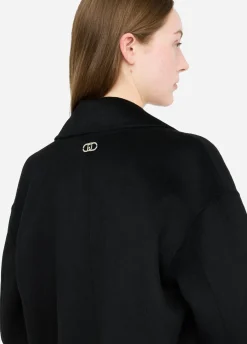 Cappotto in lana con ricami gioiello