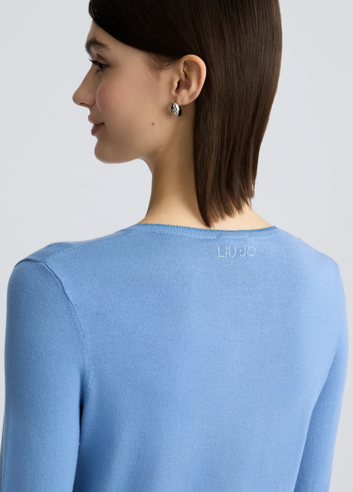 Cardigan con bottoni gioiello