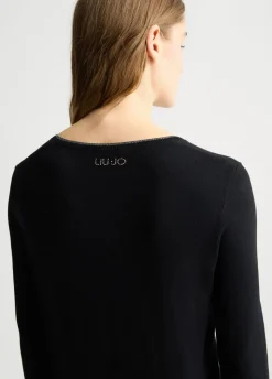 Cardigan con bottoni gioiello