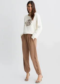 Felpa con logo animalier e strass