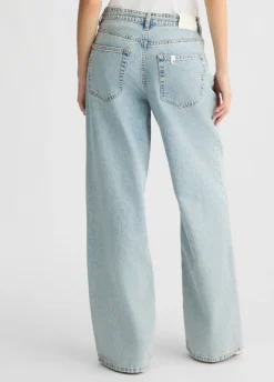 Jeans baggy con cintura floreale