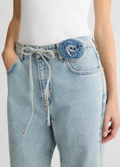 Jeans baggy con cintura floreale