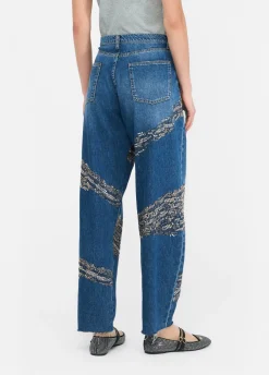 Jeans balloon con borchie e strass