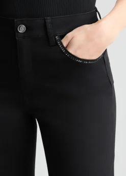Jeans bootcut con strass