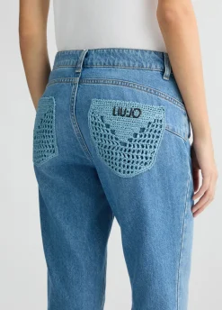 Jeans bootcut con tasche crochet