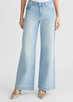 Jeans flare con borchie