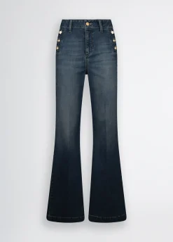 Jeans flare con bottoni gioiello