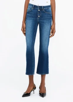 Jeans flare con bottoni gioiello