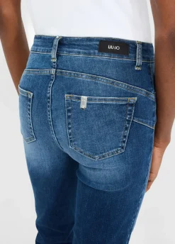 Jeans flare con bottoni gioiello