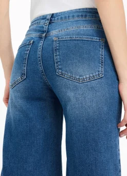 Jeans flare con charm gioiello