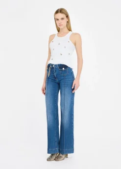 Jeans flare con charm gioiello