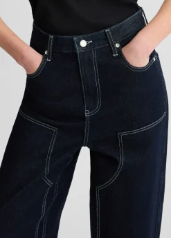 Jeans flare con cuciture a contrasto