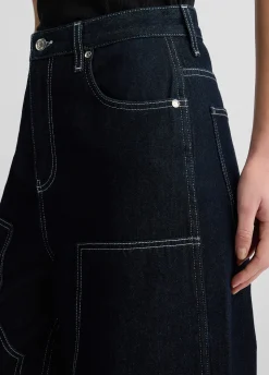 Jeans flare con cuciture a contrasto