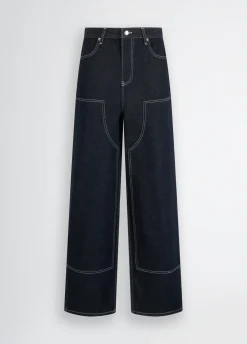 Jeans flare con cuciture a contrasto