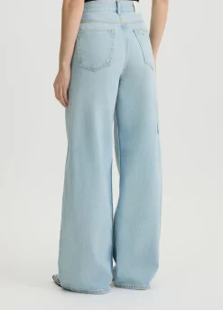 Jeans flare con piccoli strappi
