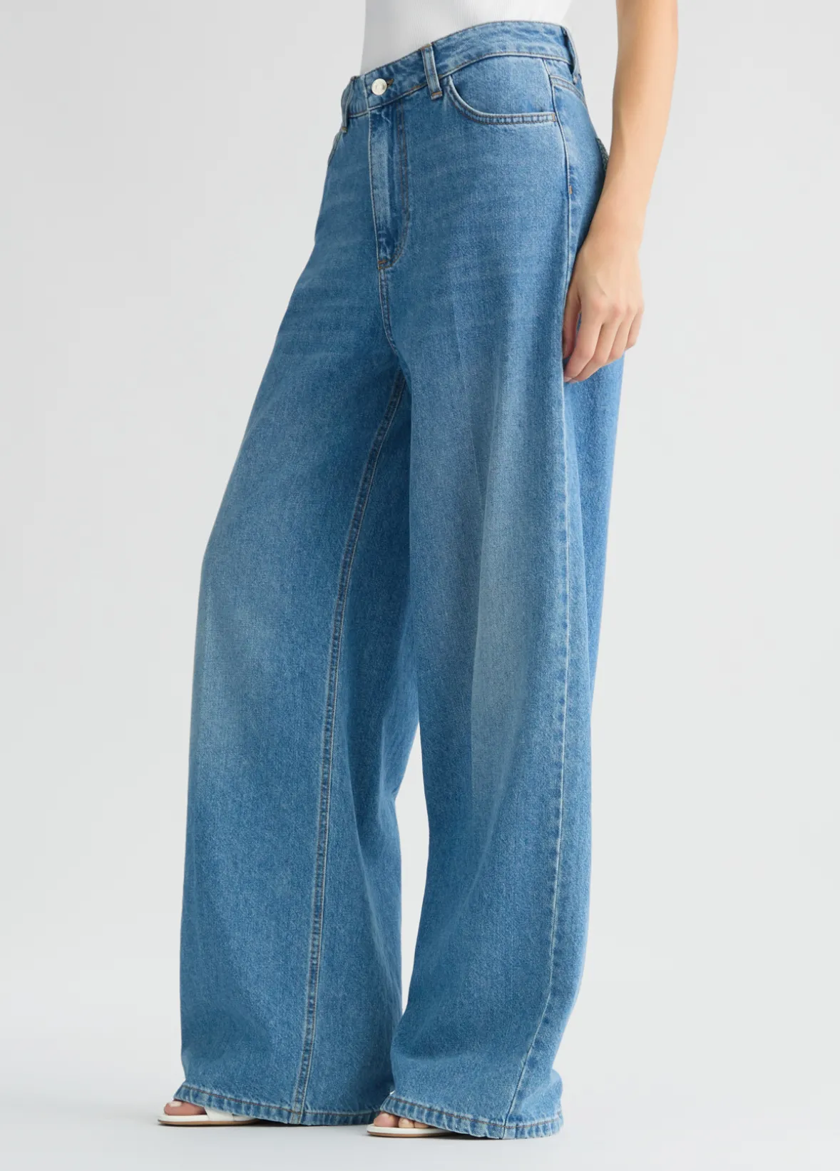 Jeans flare con tasche crochet