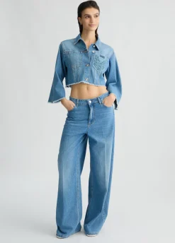 Jeans flare con tasche crochet