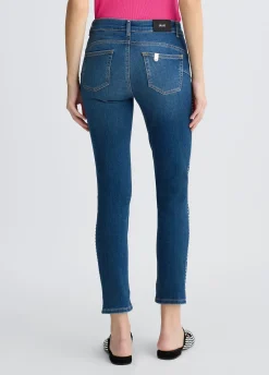 Jeans skinny con borchie