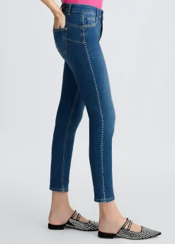 Jeans skinny con borchie