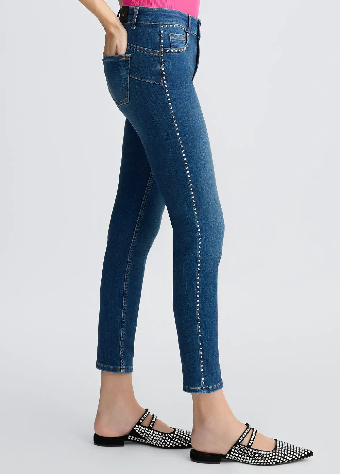 Jeans skinny con borchie