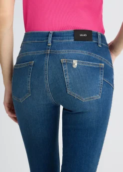 Jeans skinny con borchie