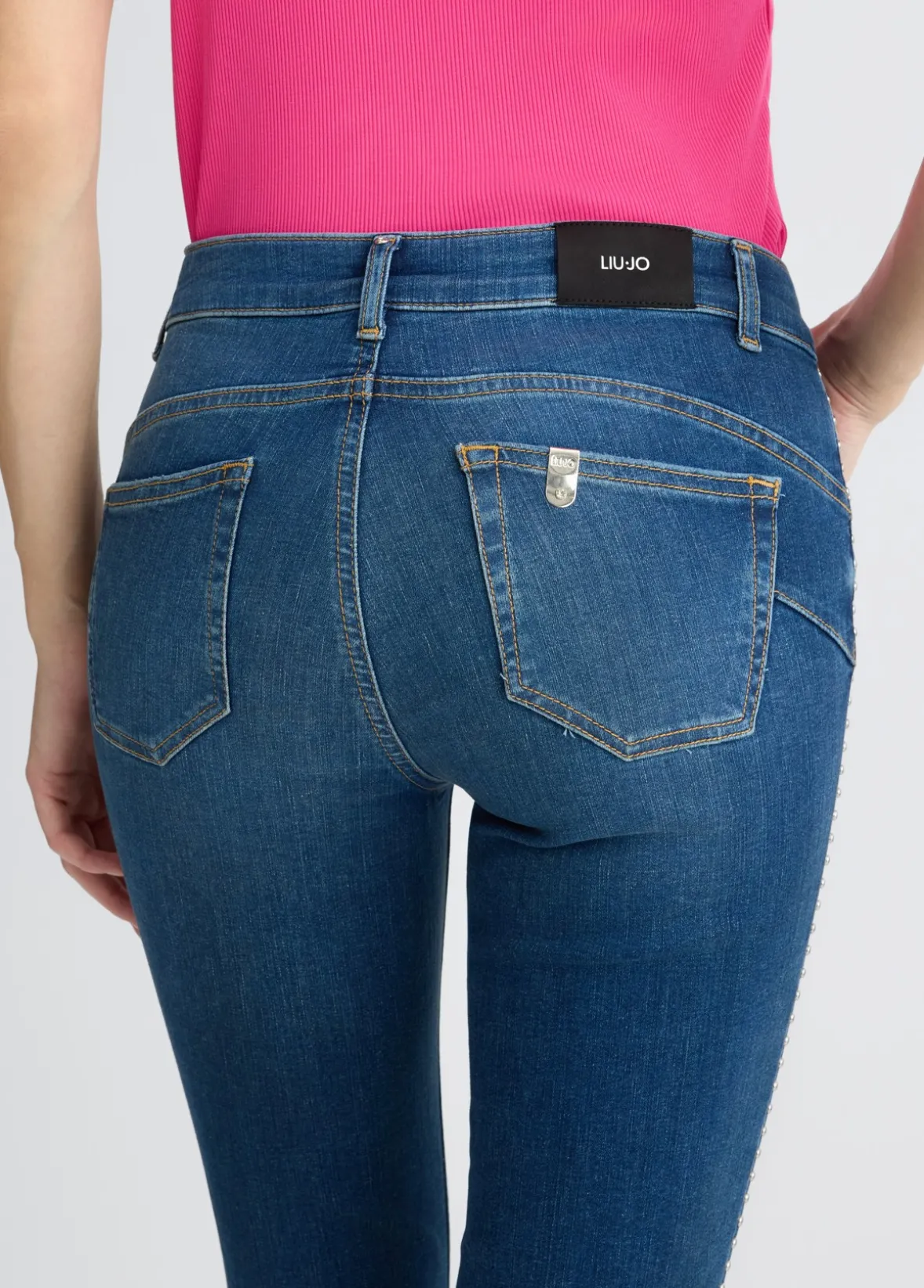 Jeans skinny con borchie