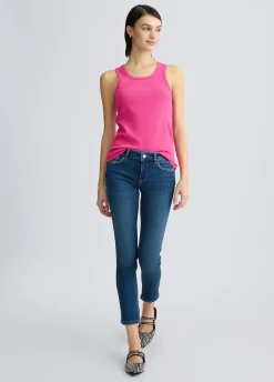 Jeans skinny con borchie