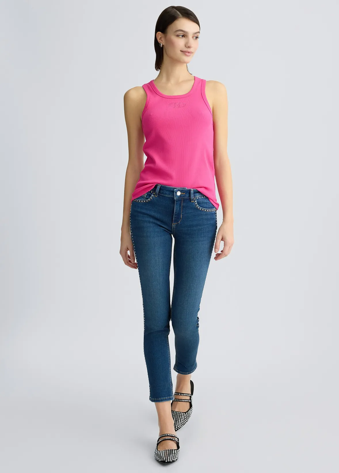 Jeans skinny con borchie