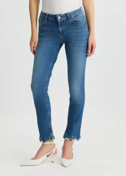 Jeans skinny con catene