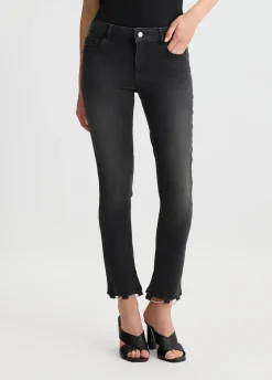 Jeans skinny con catene