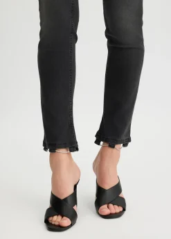 Jeans skinny con catene