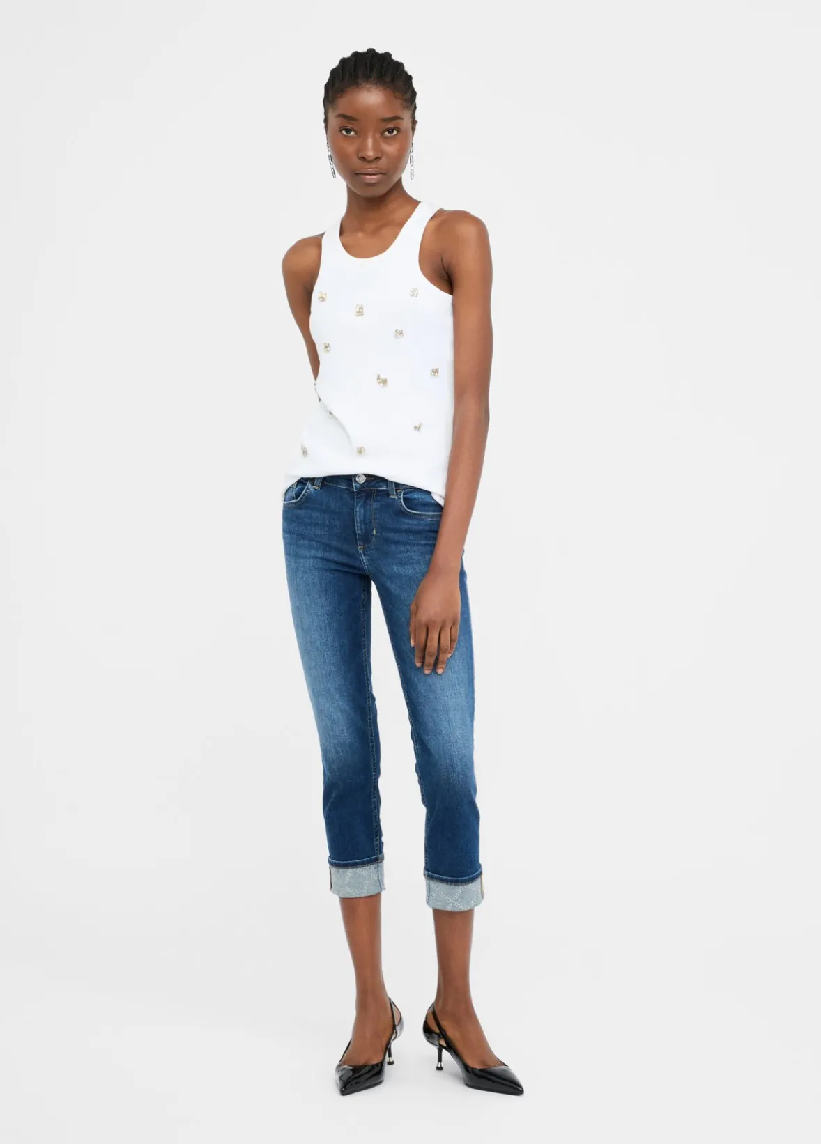 Jeans skinny con risvolto