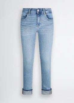 Jeans skinny con risvolto