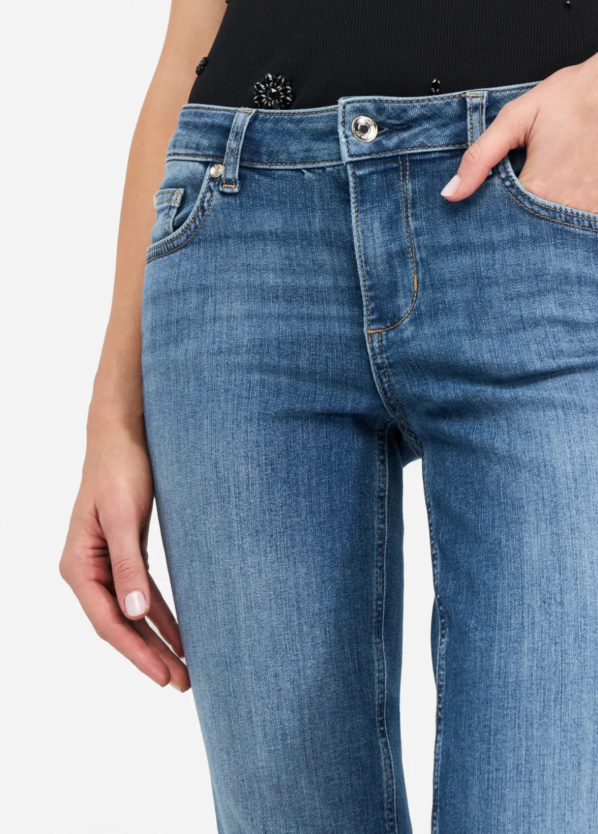 Jeans skinny con risvolto