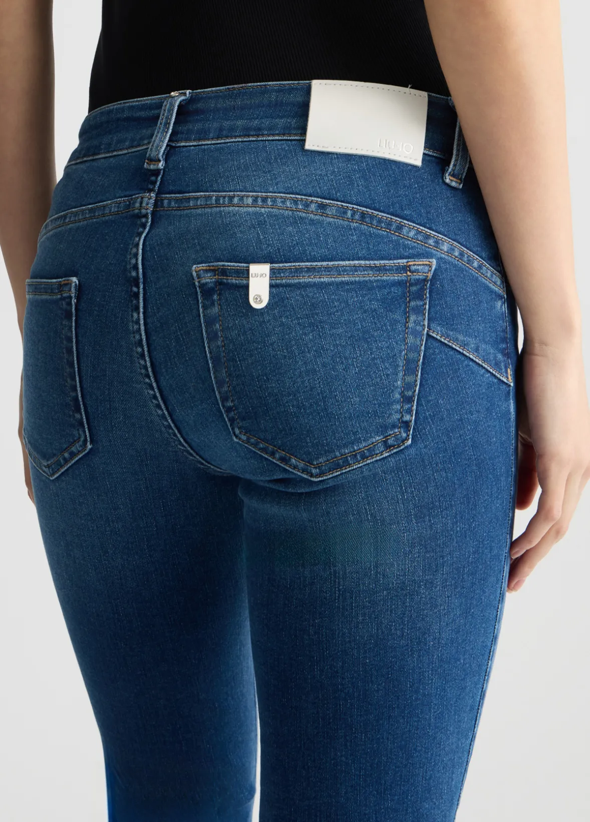 Jeans skinny con spacchetti