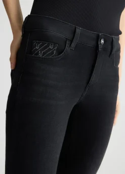 Jeans skinny con spacchetti