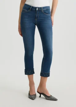 Jeans skinny cropped con risvolto