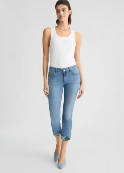 Jeans skinny cropped con risvolto bandana