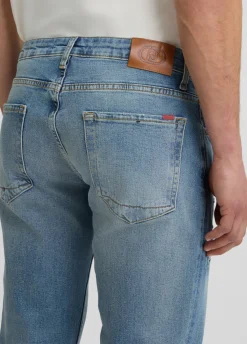 Jeans slim fit con strappi