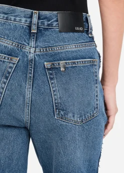 Jeans straight con pizzo