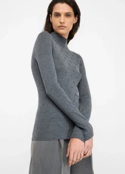 Maglia 100% lana con applicazioni