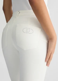 Pantaloni bootcut con logo strass